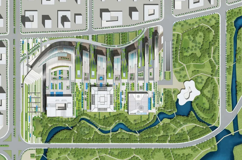 Site plan drawing showing the curved building nestled between green park space and urban grid