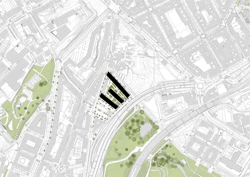 Site plan drawing showing two angled residential blocks positioned between green spaces and transit infrastructure