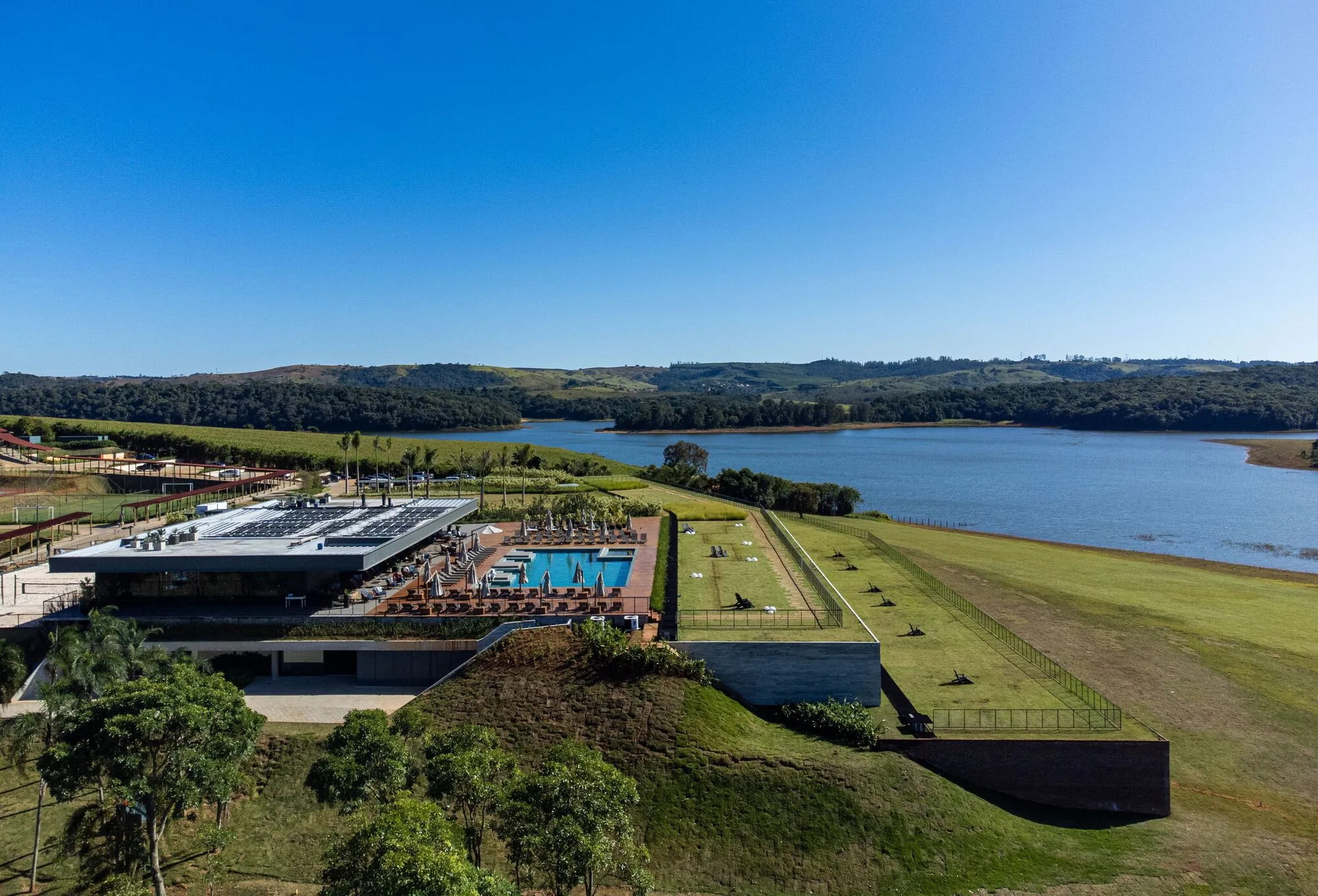 Studio DWG and Ponto de Apoio Bury a 15,000-Square-Meter Resort Expansion into a Brazilian Hillside