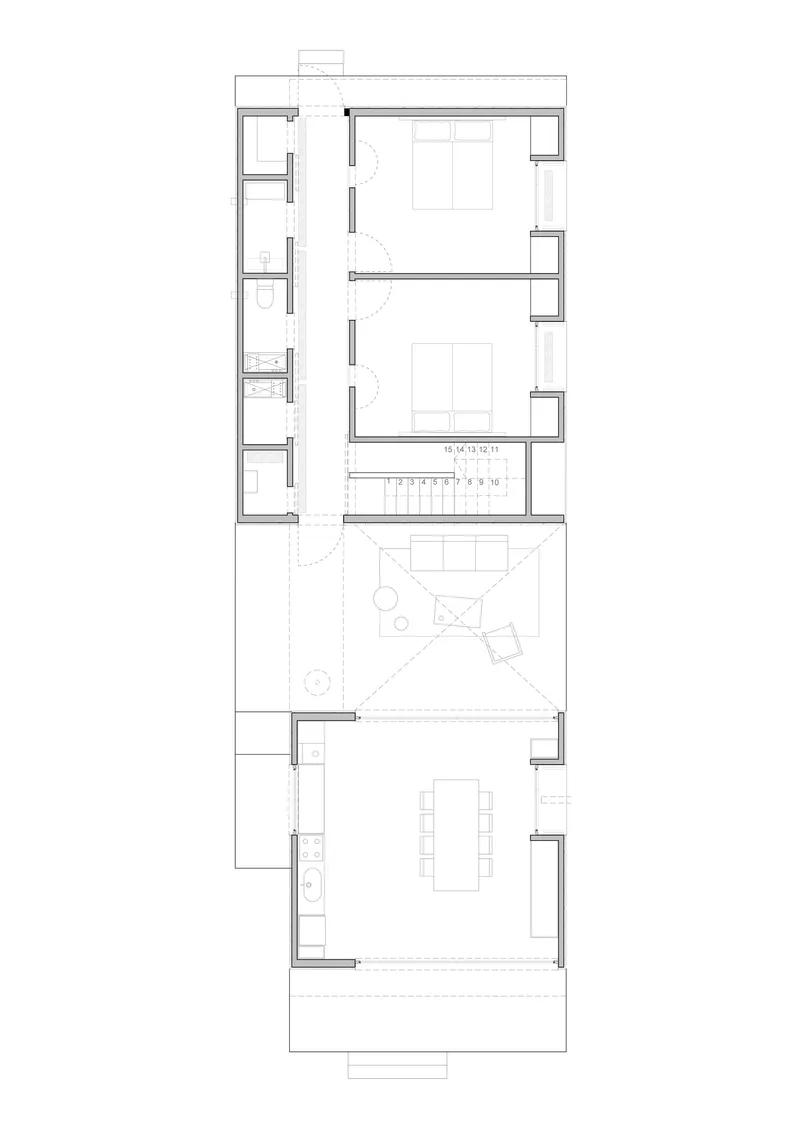 Floor plan drawing showing a multi-level residence with staircase, two bedrooms, courtyard and open living area