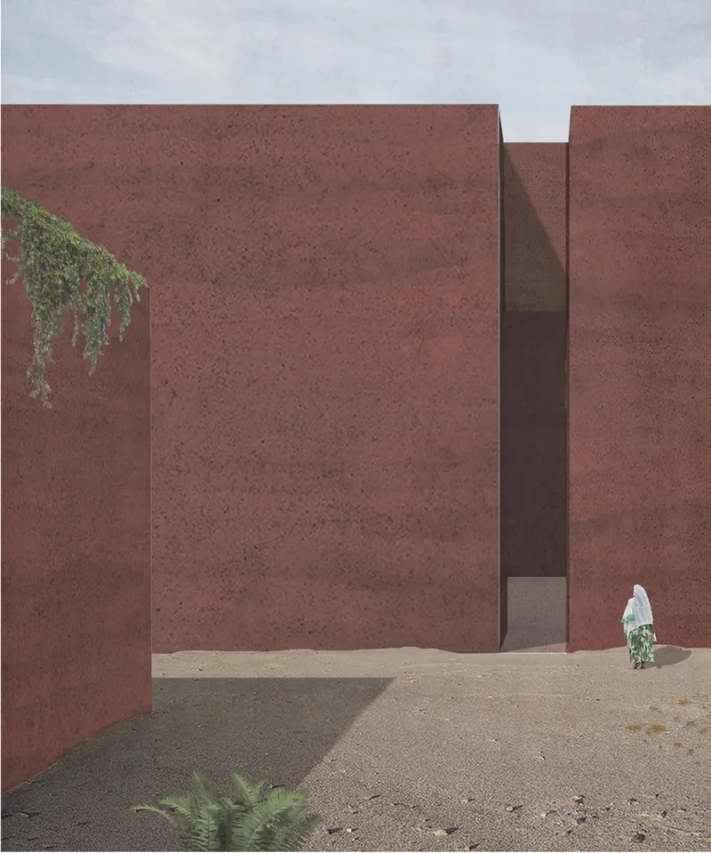 Rift-like entrance framed by massive red earth walls, creating a quiet threshold into the chapel.