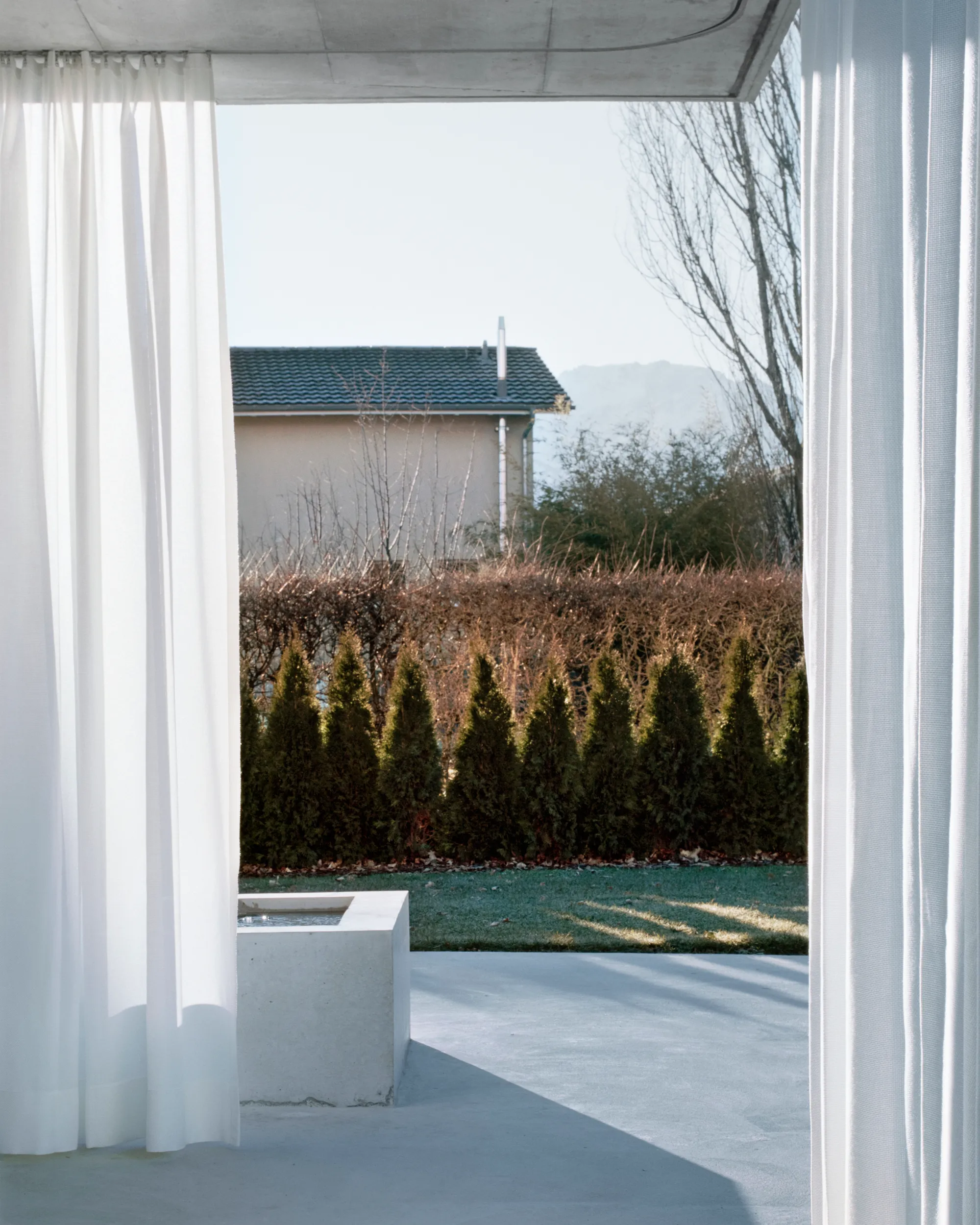 Allen + Crippa and Berger and Partner AG Wrap a Swiss Concrete House in a Textile Dress