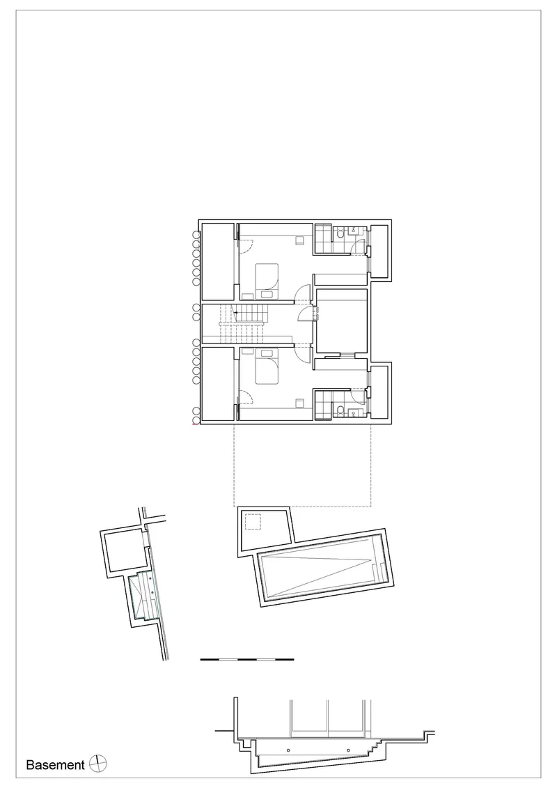 Basement floor plan drawing showing upper level rooms and angled structures below