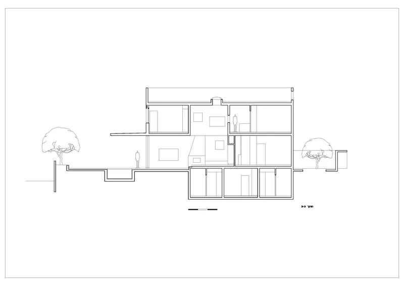 Section drawing showing three-story residence with double-height spaces and trees flanking the structure