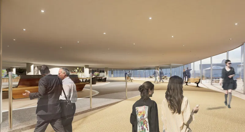Flexible collaboration zones combine hospitality, workspace, and relaxation within a contemporary vertical community.