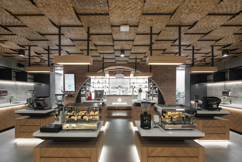 Symmetrical view of central bar with tiered woven ceiling and brick arched wall flanked by service stations