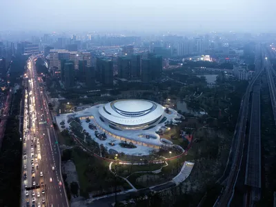 CSADI Sinks a Massive E-Sports Arena Beneath a Spiraling Vortex Roof in Hangzhou