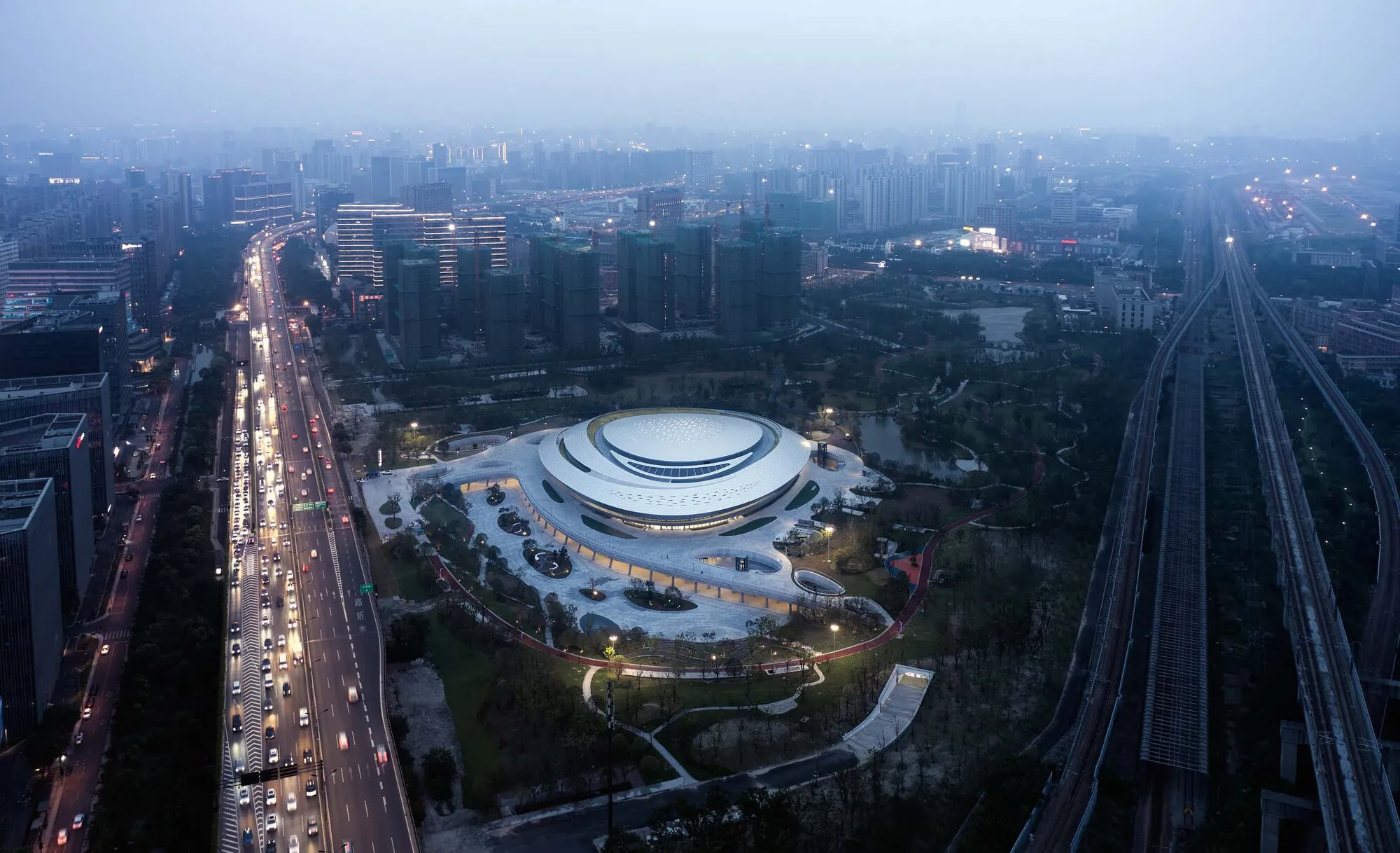 CSADI Sinks a Massive E-Sports Arena Beneath a Spiraling Vortex Roof in Hangzhou