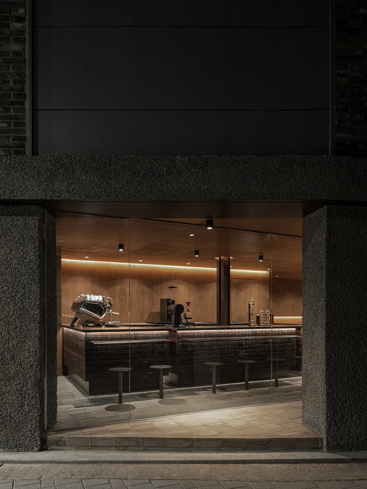 Studio Motif Carves Warmth from Concrete in a 76-Square-Meter Seoul Coffee Shop