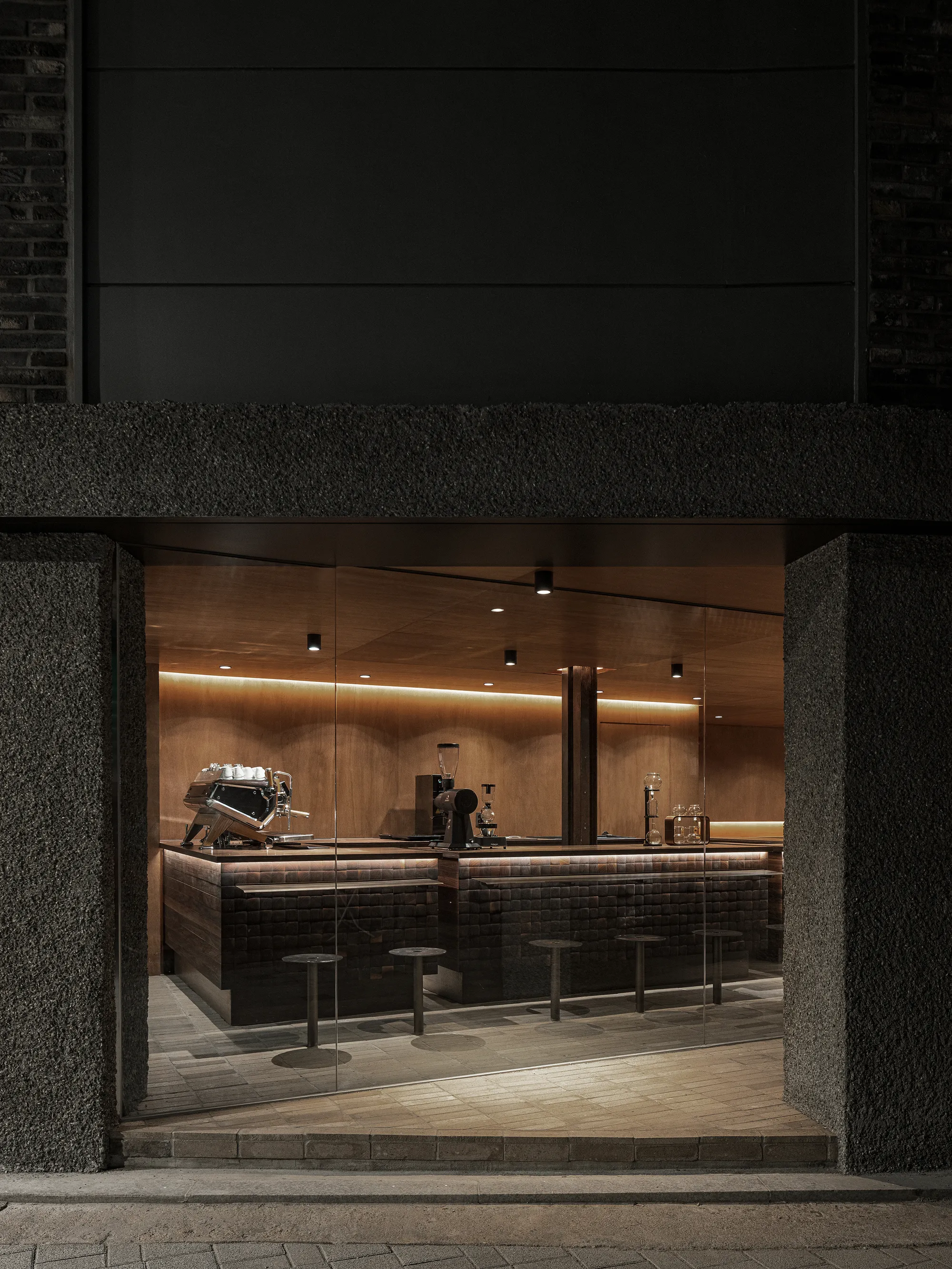 Studio Motif Carves Warmth from Concrete in a 76-Square-Meter Seoul Coffee Shop