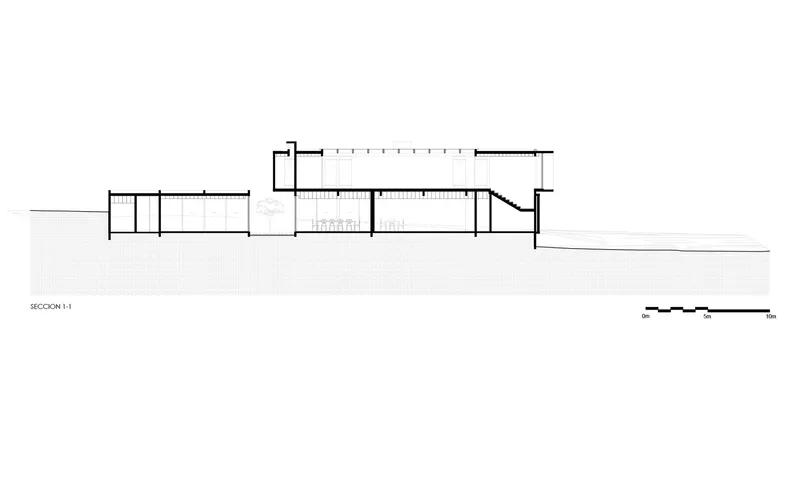 Section drawing showing split-level volumes stepping down with grade on a sloped site