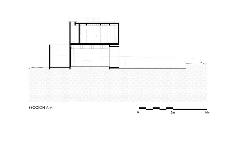 Section drawing showing a two-level structure with stairs and a sloping ground plane