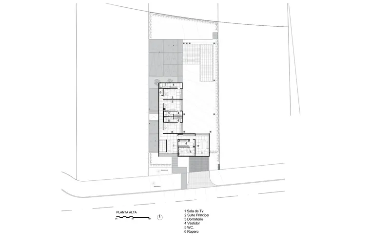 Upper floor plan showing smaller L-shaped footprint with terrace and pool deck below
