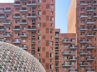 MVRDV and Studio Archohm Wrap 437 Apartments Around a Courtyard the Size of Two Football Fields