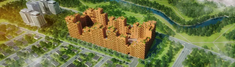 Aerial view of the interconnected perforated brick residential towers surrounded by green parkland and river