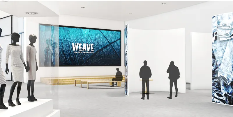 Interior exhibition space presenting sustainable textile culture through displays and digital media.