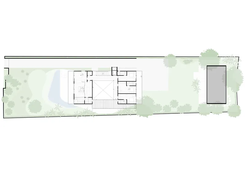 Upper floor plan depicting room layouts, central stairwell, and adjacent gardens with pool and trees