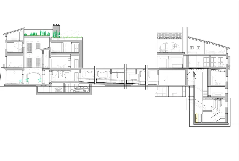 Section drawing showing multiple residential units connected by a corridor with a sunken car park