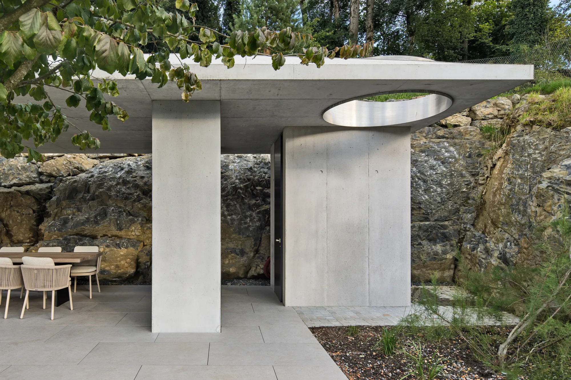 Studio EH Carves a Four-Story Concrete House into a Geological Slope in Liechtenstein