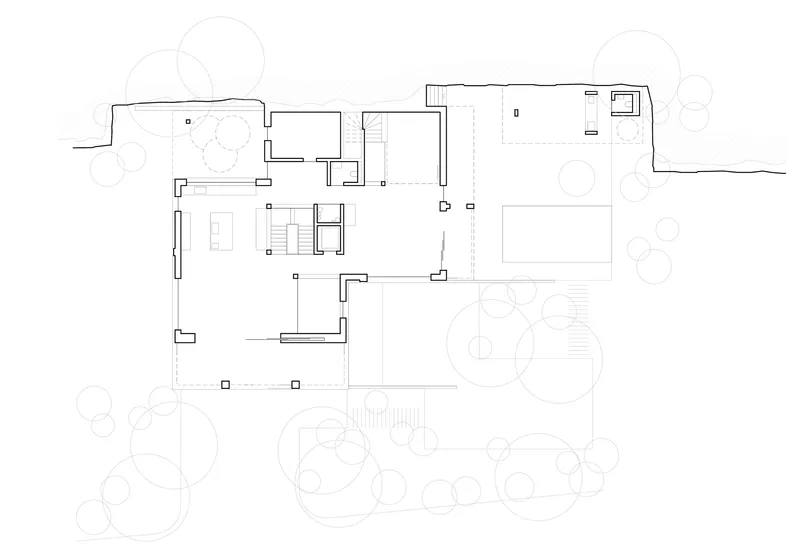Ground floor plan drawing with surrounding landscape elements indicated by circular tree symbols