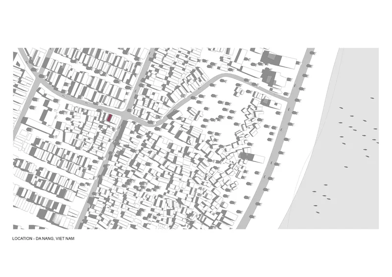 Site plan drawing showing dense urban fabric bordered by a waterfront promenade with scattered trees