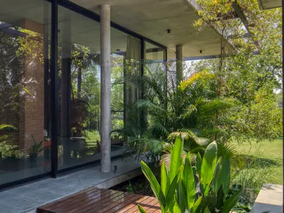 Rushi Shah Architects and Tattva Landscapes Float a Cantilevered Home Over a Lotus Pond in Ahmedabad