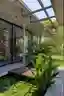 Rushi Shah Architects and Tattva Landscapes Float a Cantilevered Home Over a Lotus Pond in Ahmedabad