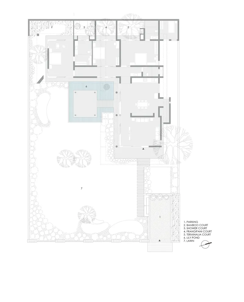 Ground floor plan drawing showing rooms arranged around a central courtyard with water feature and landscaping