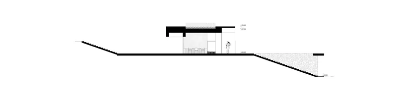 Section drawing showing the volume stepping down a sloped site with interior spaces