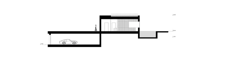 Section drawing showing split-level spaces with garage below and living areas above grade