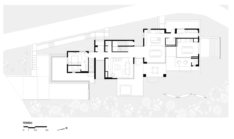 Floor plan drawing showing ground level with living areas and pool terrace surrounded by landscape