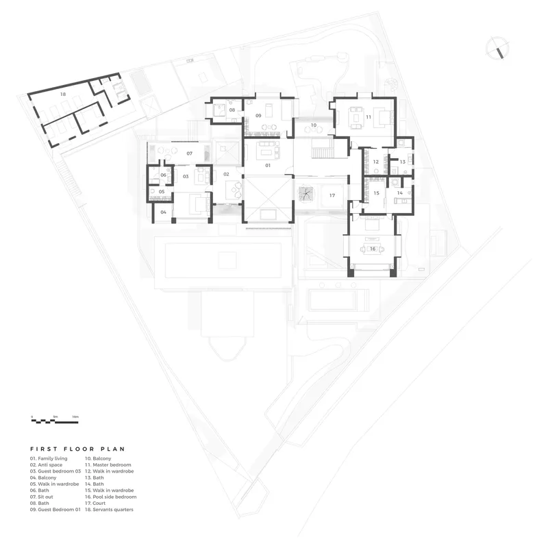 First floor plan drawing showing bedroom suites and voids clustered around a central courtyard atrium