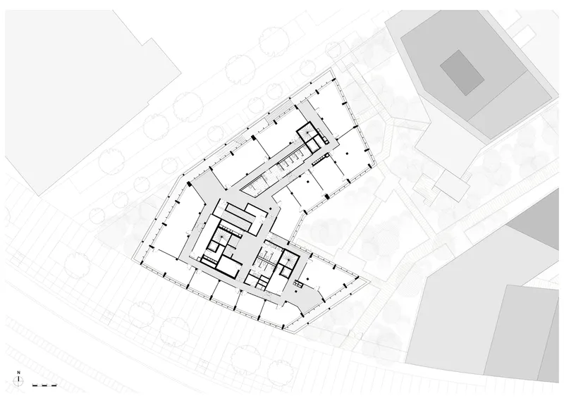 Floor plan drawing illustrating an angled perimeter with interior rooms clustered around a central core