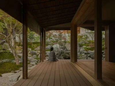 kooo architects Strip a Kyoto Sukiya House Back to Its Roots and Add a Garden Waterfall Between Buildings