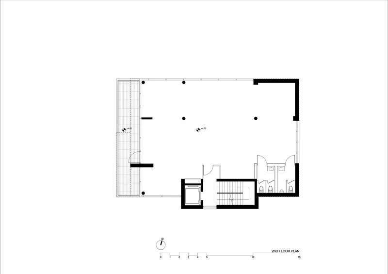 Second floor plan showing the main living space with corner terrace and central stair