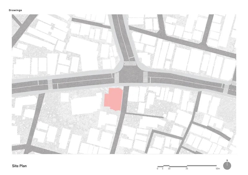 Site plan drawing showing the plot location highlighted in pink within an urban street grid and adjacent parcels