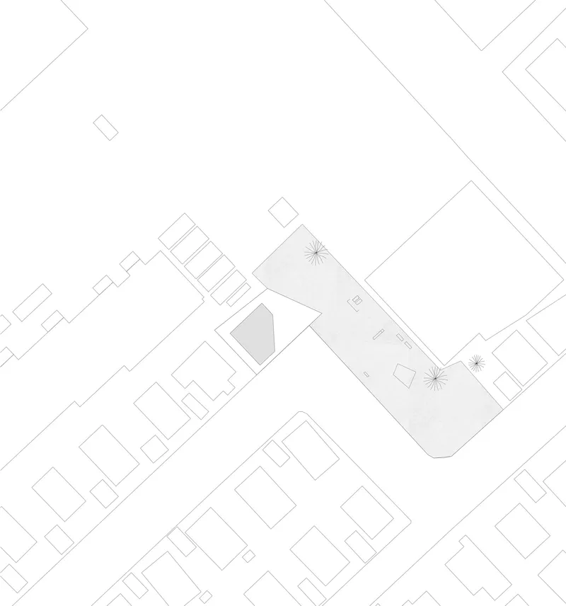 Site plan drawing showing a trapezoidal volume with courtyard positioned among neighboring rectangular structures