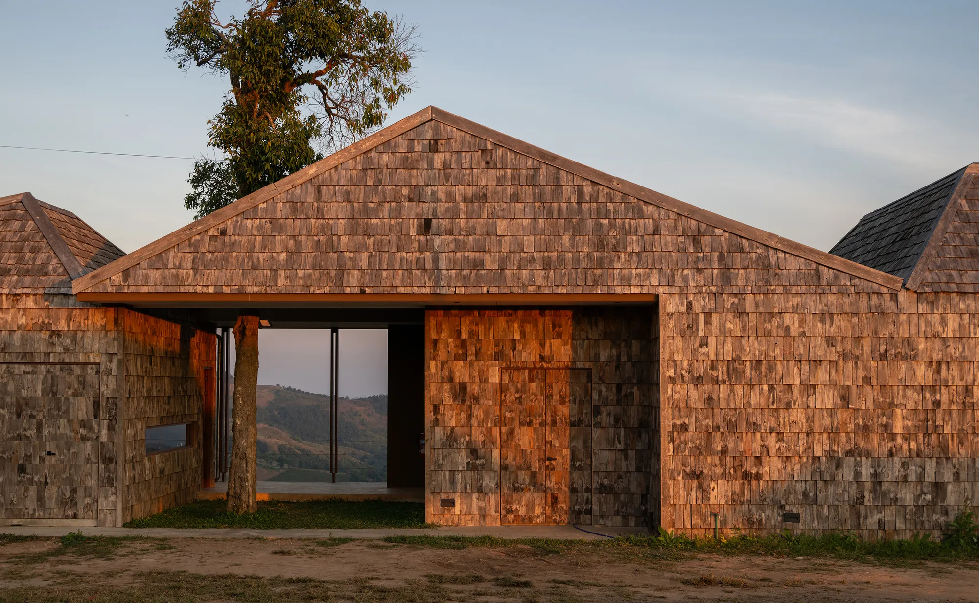S.O.S Architects Scatters a Cluster of Timber Pavilions Across a Chiang Rai Hillside