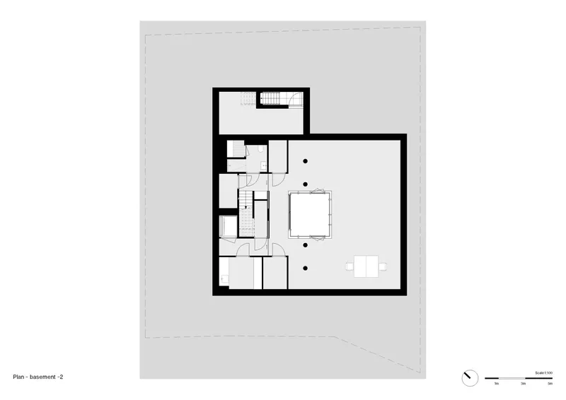 Basement level floor plan showing bathroom clusters and open living area with stair