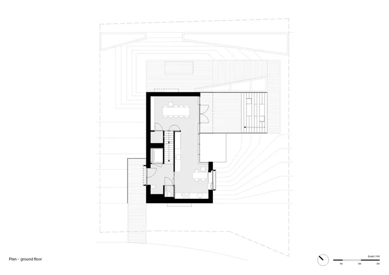 Ground floor plan drawing showing L-shaped layout with thick walls and surrounding topographic contours