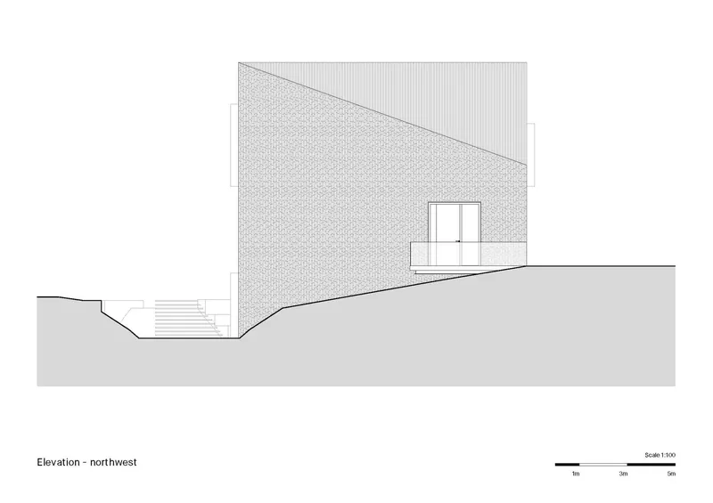Northwest elevation drawing showing sloped volume with textured wall and small window opening