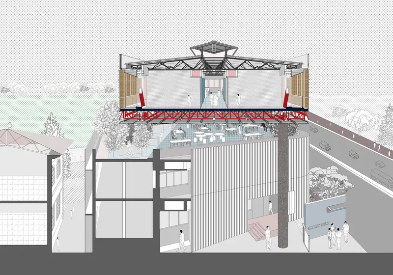 Sectional drawing showing a rooftop gantry crane structure above a multi-level building with vertical metal cladding