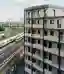 Studio Woodroffe Papa Wraps 111 Apartments Around a Courtyard with Saw-Tooth Balconies in Bermondsey