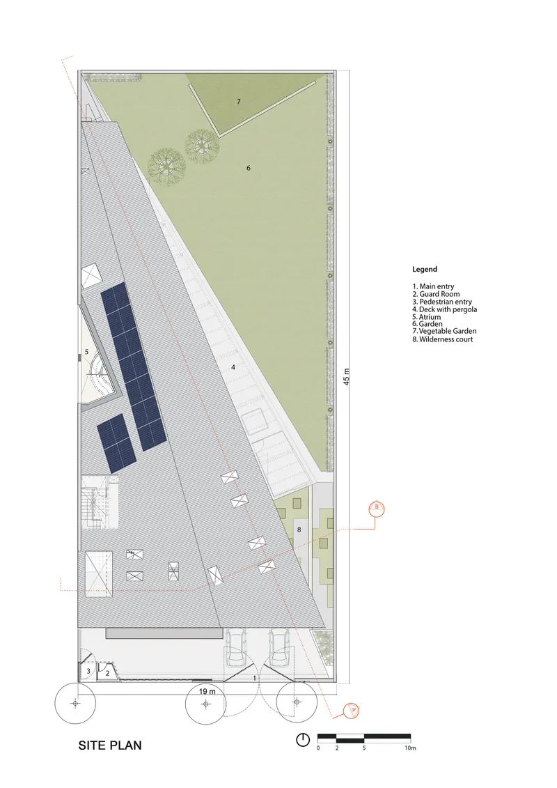 Site plan drawing showing triangular building footprint with adjacent lawn and tree placements