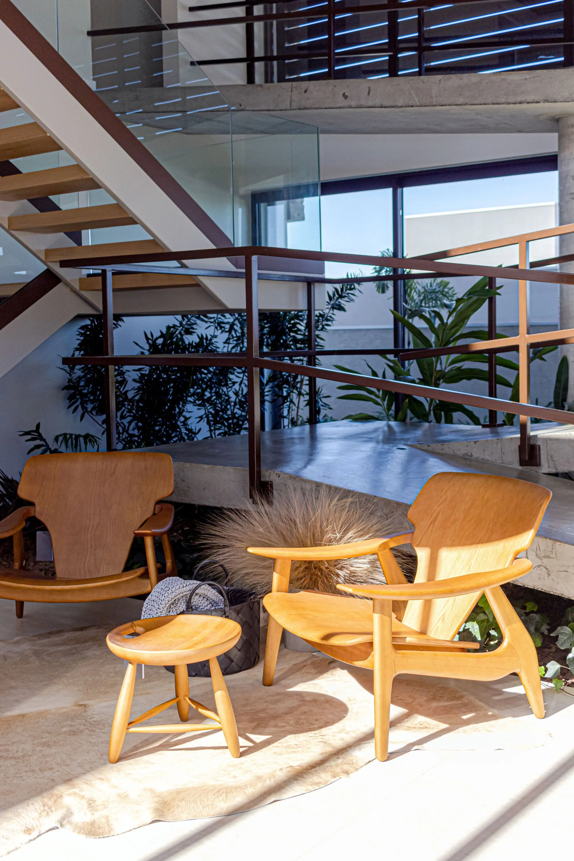Coelho Neto Arquitetura Organizes a Brazilian Valley House Around a Central Ramp and Planted Atrium