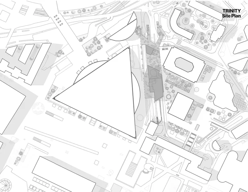 Site plan drawing showing multiple buildings arranged along curving streets and landscaped areas