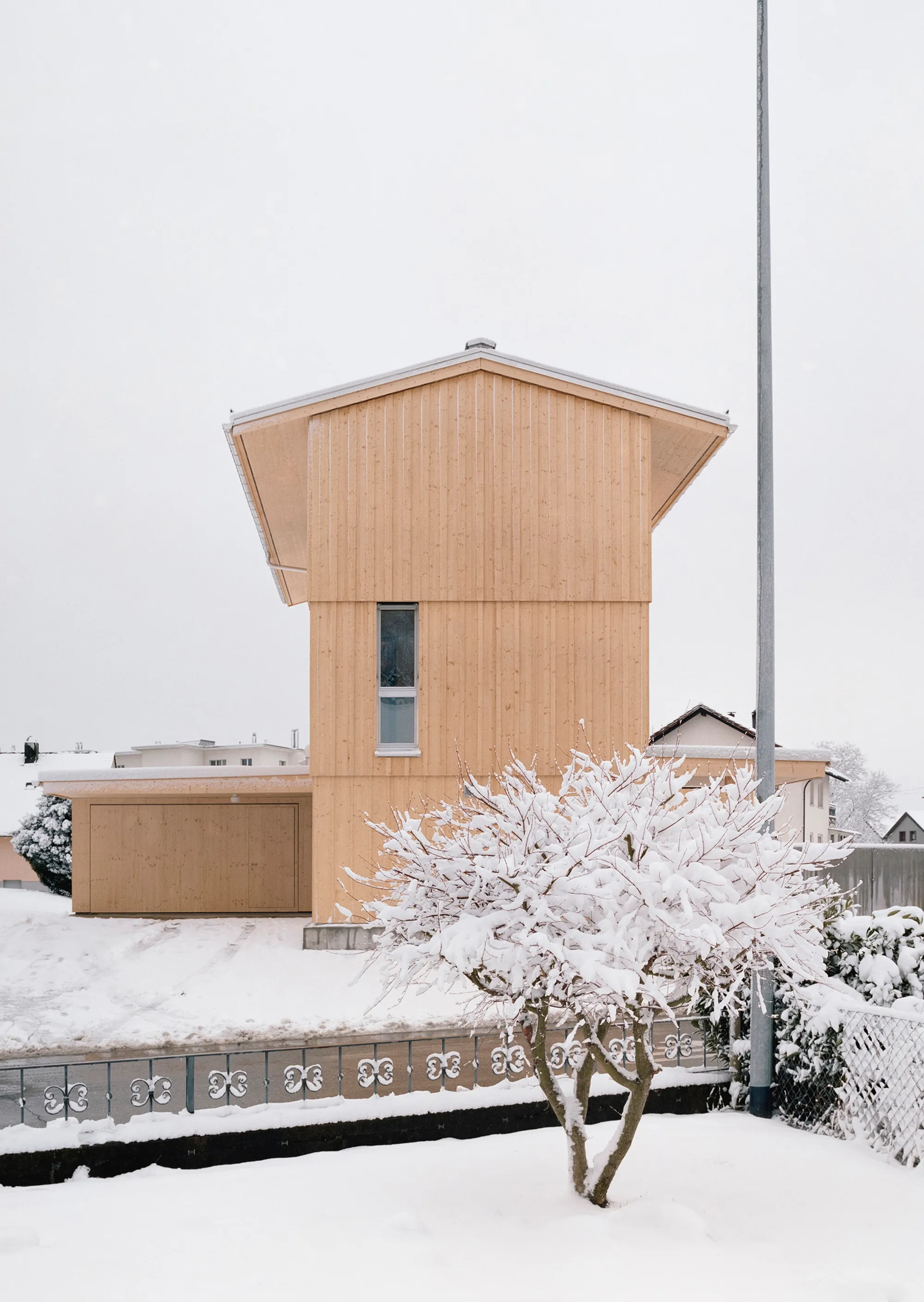 kit Architects Stack a Timber Tower House on a Triangular Plot in the Swiss Rhine Valley