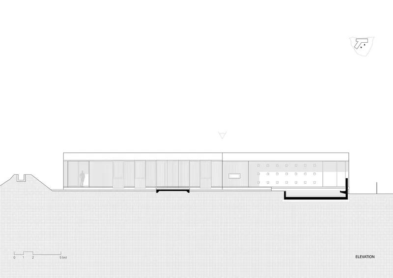 Elevation drawing showing a long horizontal structure with vertical wood fins and a grid facade section