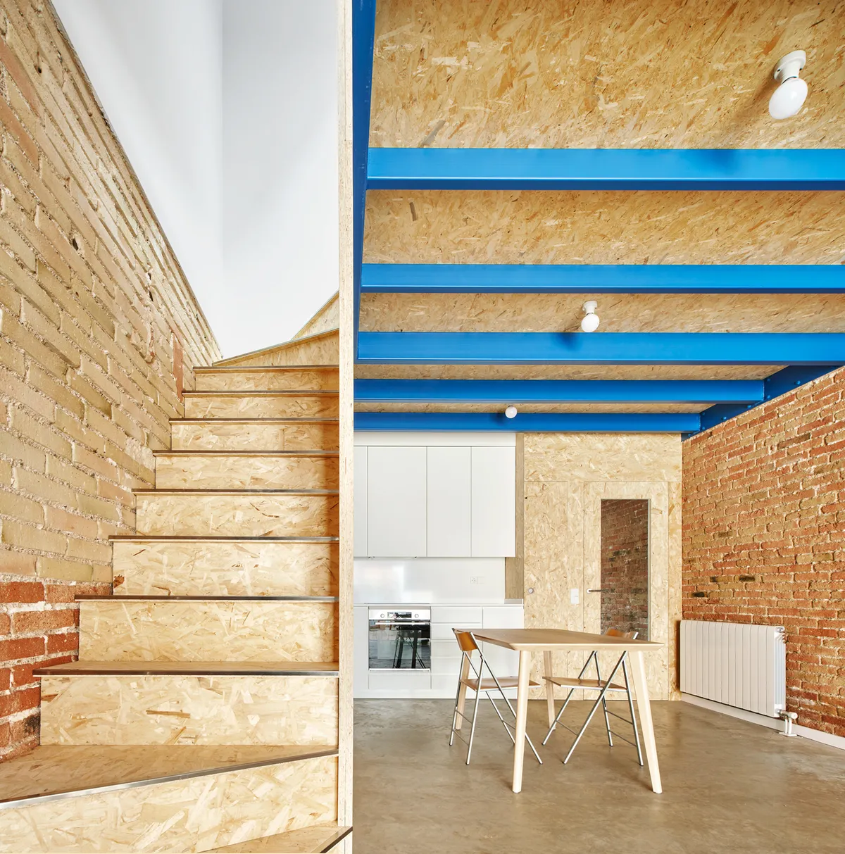 Vallribera Arquitectes Tucks a Full Family Home Inside a Single-Storey Row House Near Barcelona