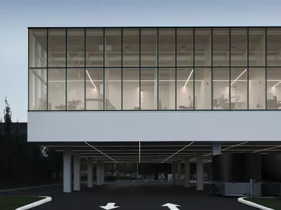 Jean Verville Turns a Forgotten Lot in Longueuil into a Glass Dental Clinic Rooted in Biophilia